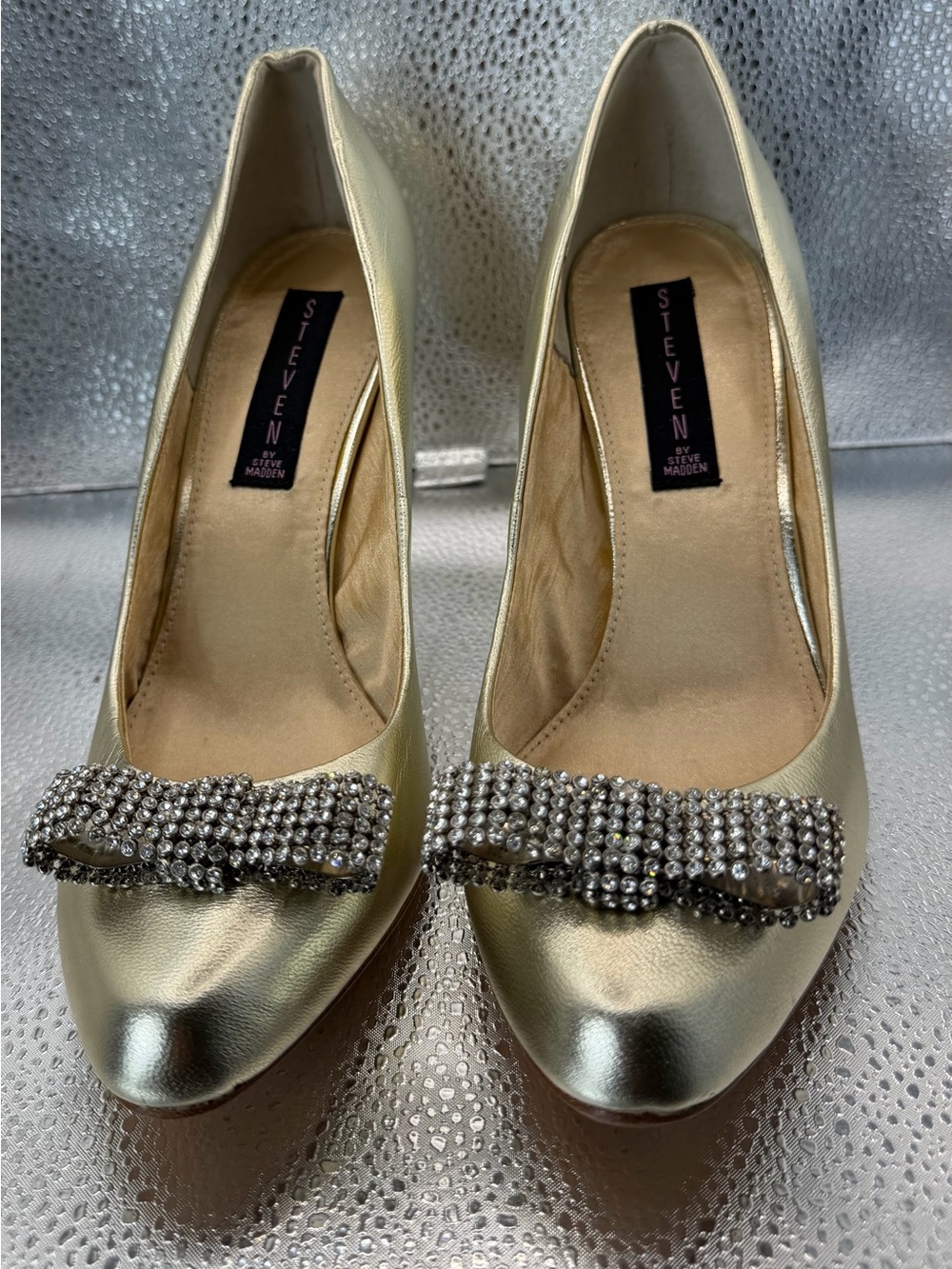 Steven by Steve Madden champagne gold stiletto pumps with rhinestone bow size 9
